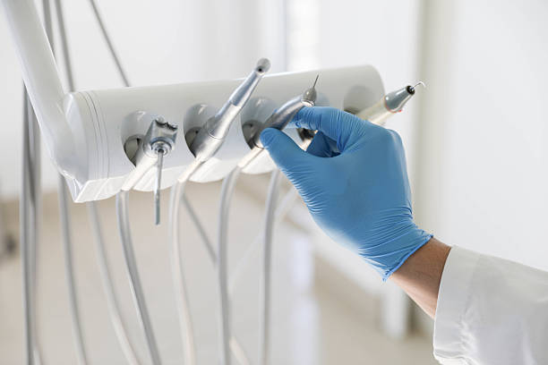 Professional Root Canal Treatment technician working in Welsh, LA